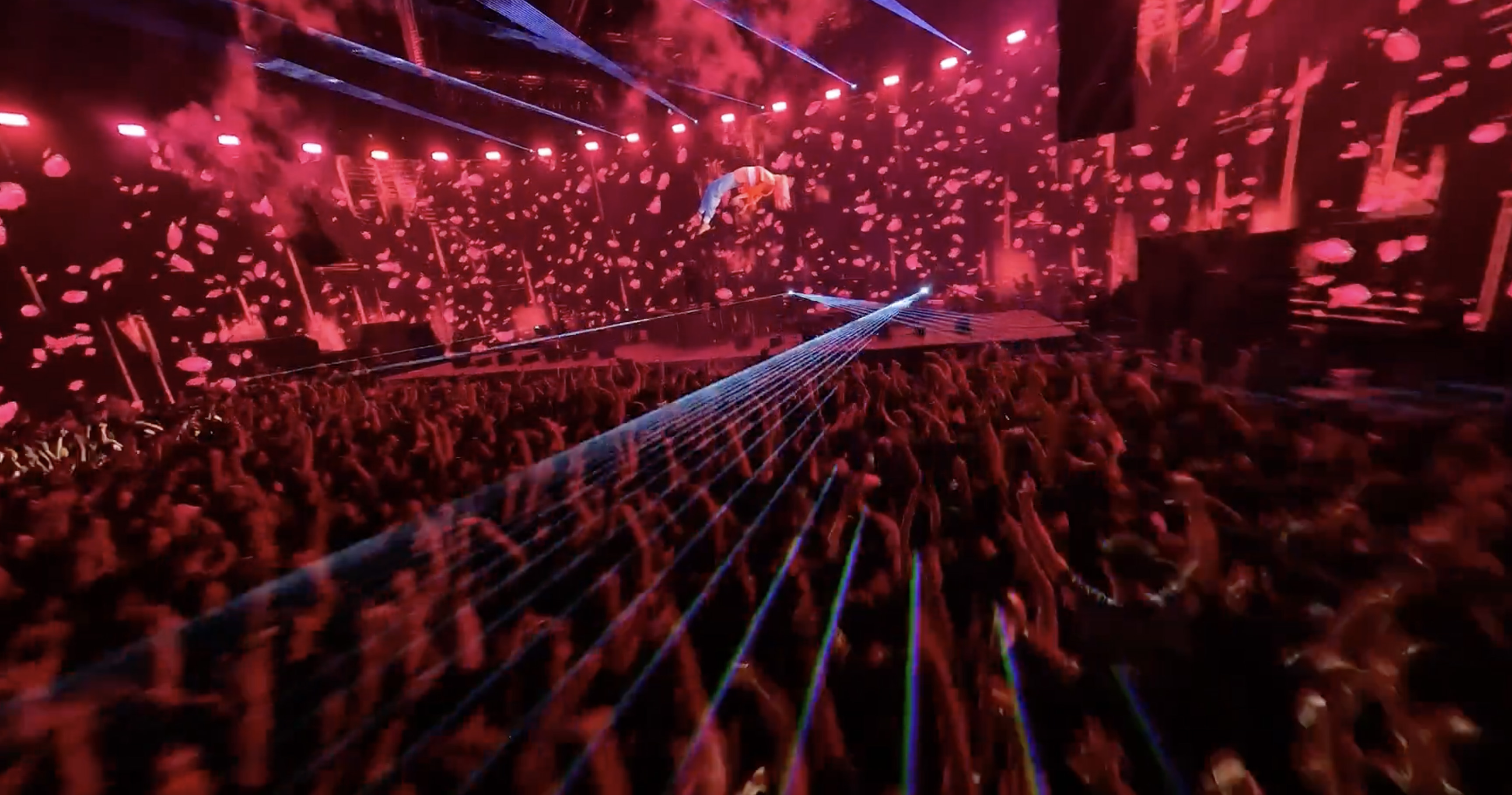 FPV drone shot over concert crowd